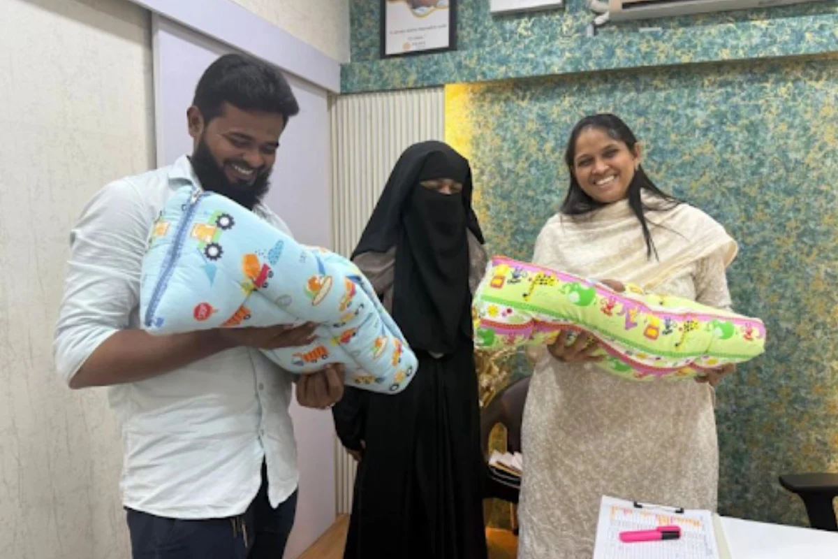 Parents with their newborn twins